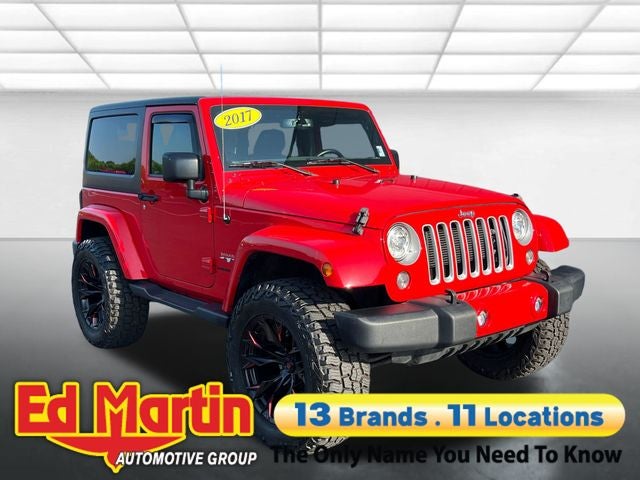2017 Jeep Wrangler Sahara in Red Clearcoat — front three-quarter view