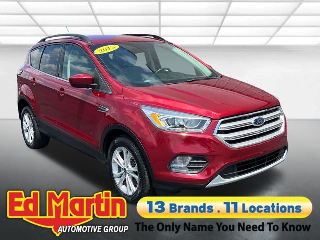 2018 Ford Escape SEL in Ruby Red Metallic — front three-quarter view